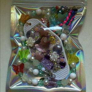 mystery pack - beaded necklace, beaded bag charm keychain, hotel keychain